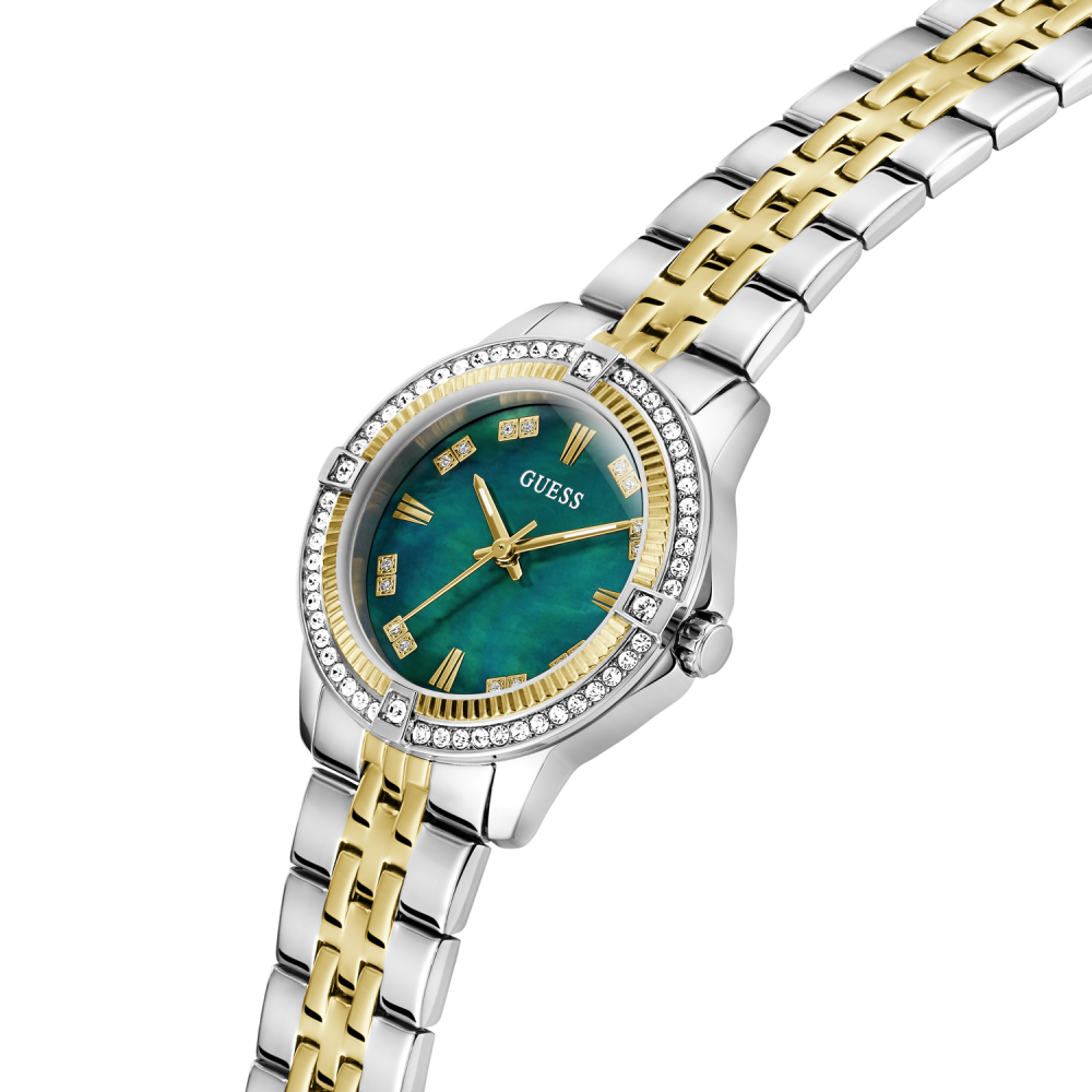 Two-tone watch with green face and gold accents on a white background