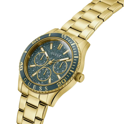 Gold watch with a blue face on a light gray background
