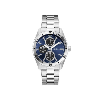 A silver stainless steel wrist watch with a blue dial, featuring three sub-dials, silver-tone hands and markers, and a matching silver metal link bracelet. The brand name 'GUESS' is printed on the dial.