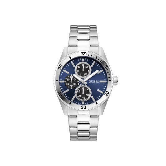 A silver stainless steel wrist watch with a blue dial, featuring three sub-dials, silver-tone hands and markers, and a matching silver metal link bracelet. The brand name 'GUESS' is printed on the dial.