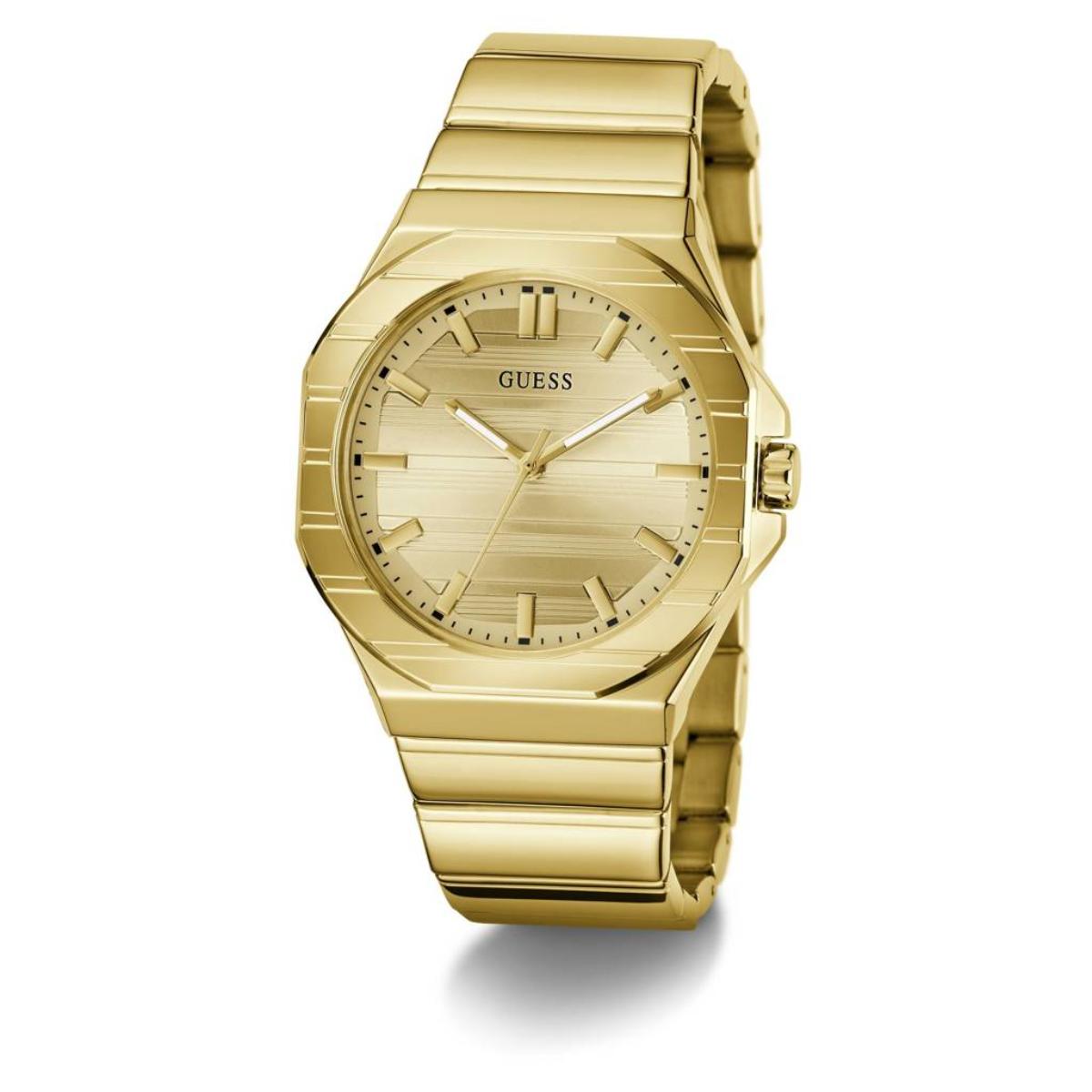 Gold watch with 'Guess' brand on a white background