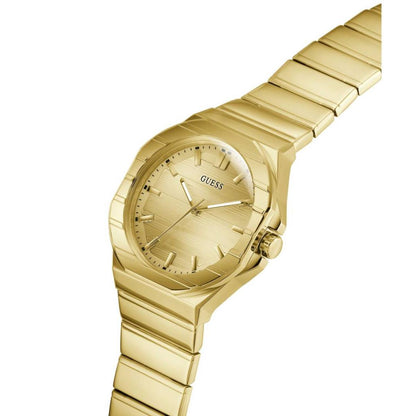Gold watch with 'GUESS' branding on a white background