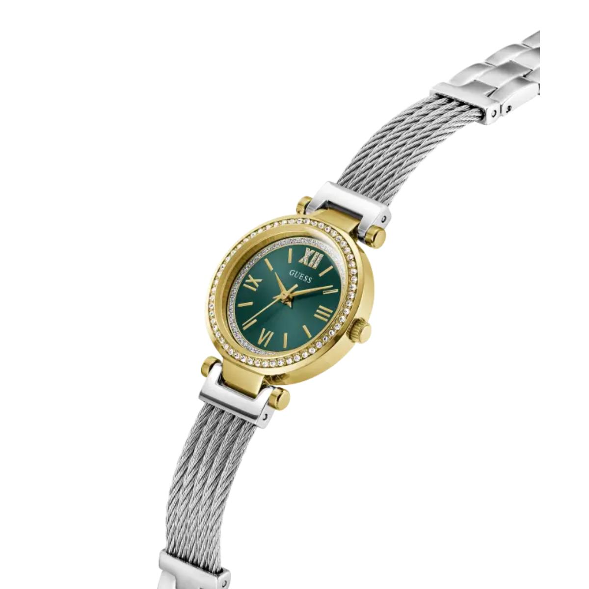 Wristwatch with green dial and gold accents on a white background
