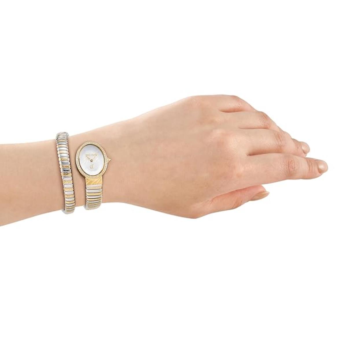 Hand wearing a gold watch and bracelet on a white background