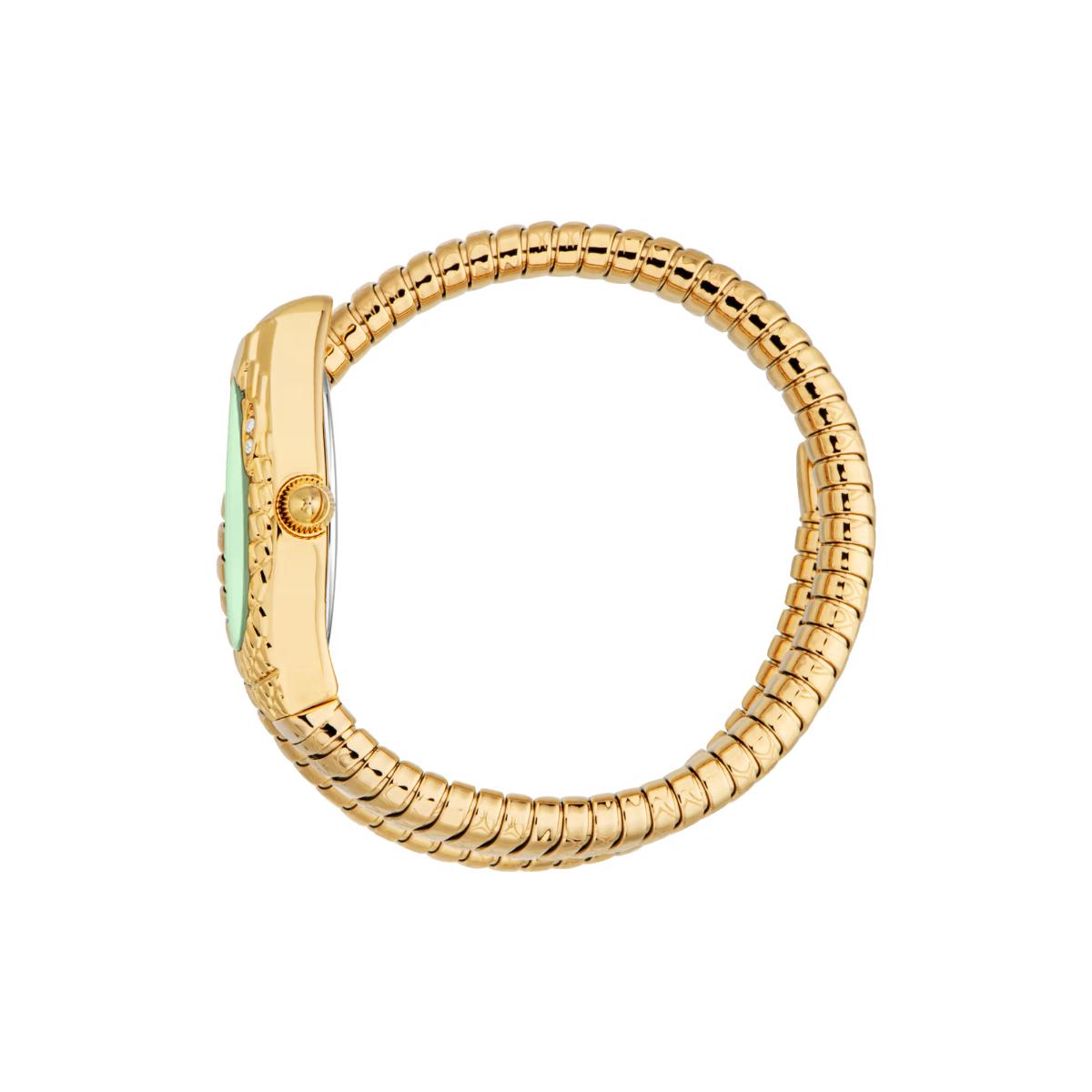 Gold ring with a green gemstone on a white background
