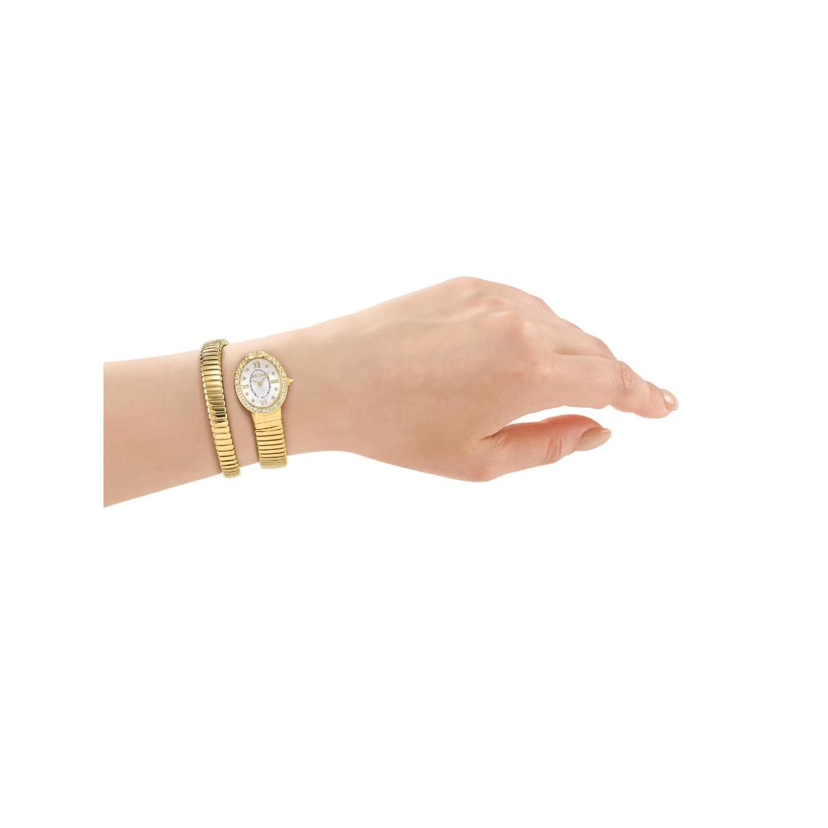 Hand wearing a gold watch and bracelets on a white background