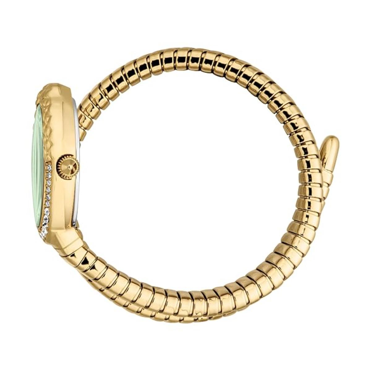 Gold ring with a green gemstone on a white background
