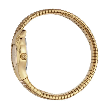 Gold watch with a textured band on a white background