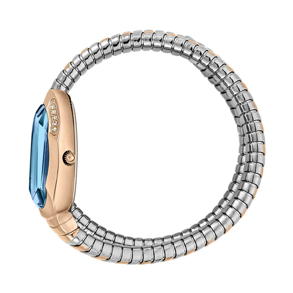 Two-toned ring with blue gemstone on a white background