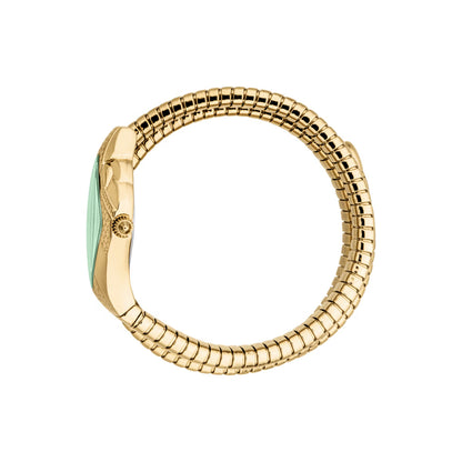 Gold ring with a green gemstone on a white background