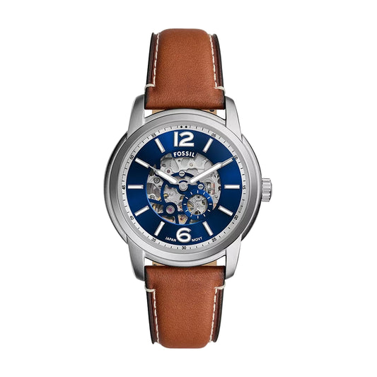 Fossil watch with brown leather strap and blue face on white background