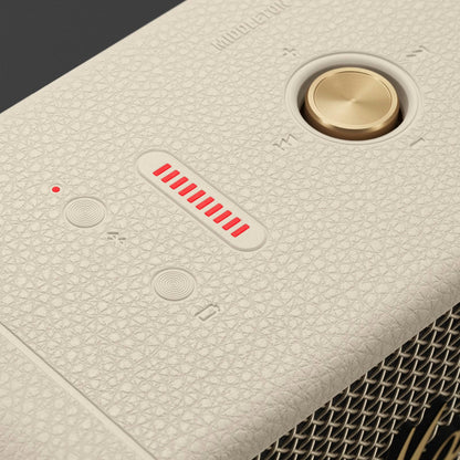 Close-up of a textured electronic device with control buttons and indicator lights.