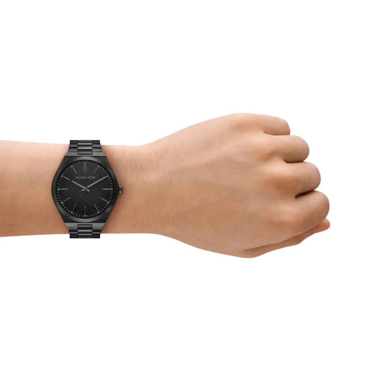 Black wristwatch on a wrist against a white background