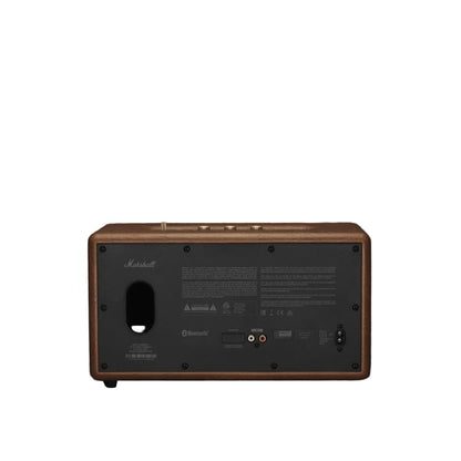 Back view of a wooden Marshall amplifier on a dark background