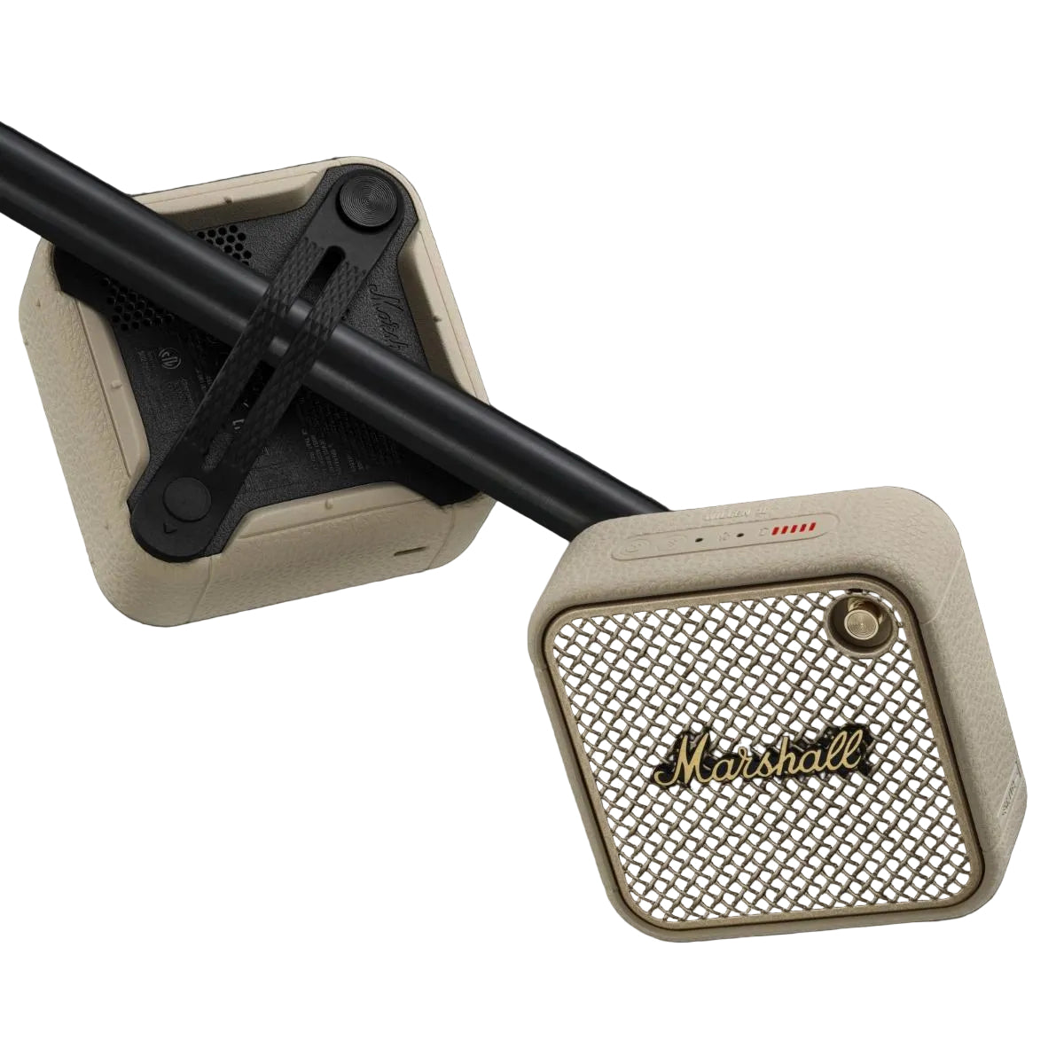 Marshall speaker with beige finish and black accents on a dark background