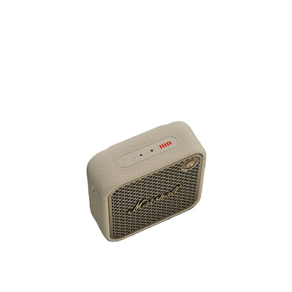 Beige Marshall speaker on a dark gray background