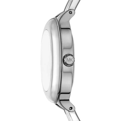 Close-up of a silver watch with a visible brand logo on a white background