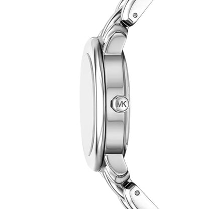 Close-up of a silver Michael Kors watch on a white background