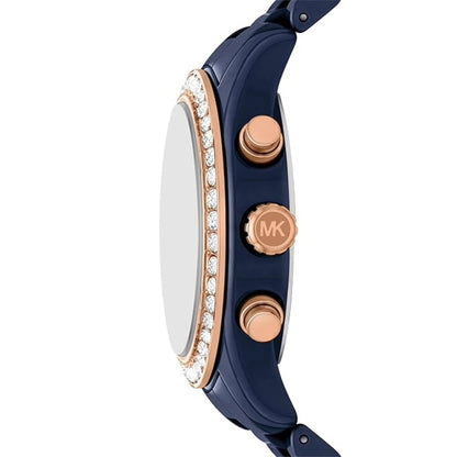 Close-up of a blue watch with rose gold accents on a white background
