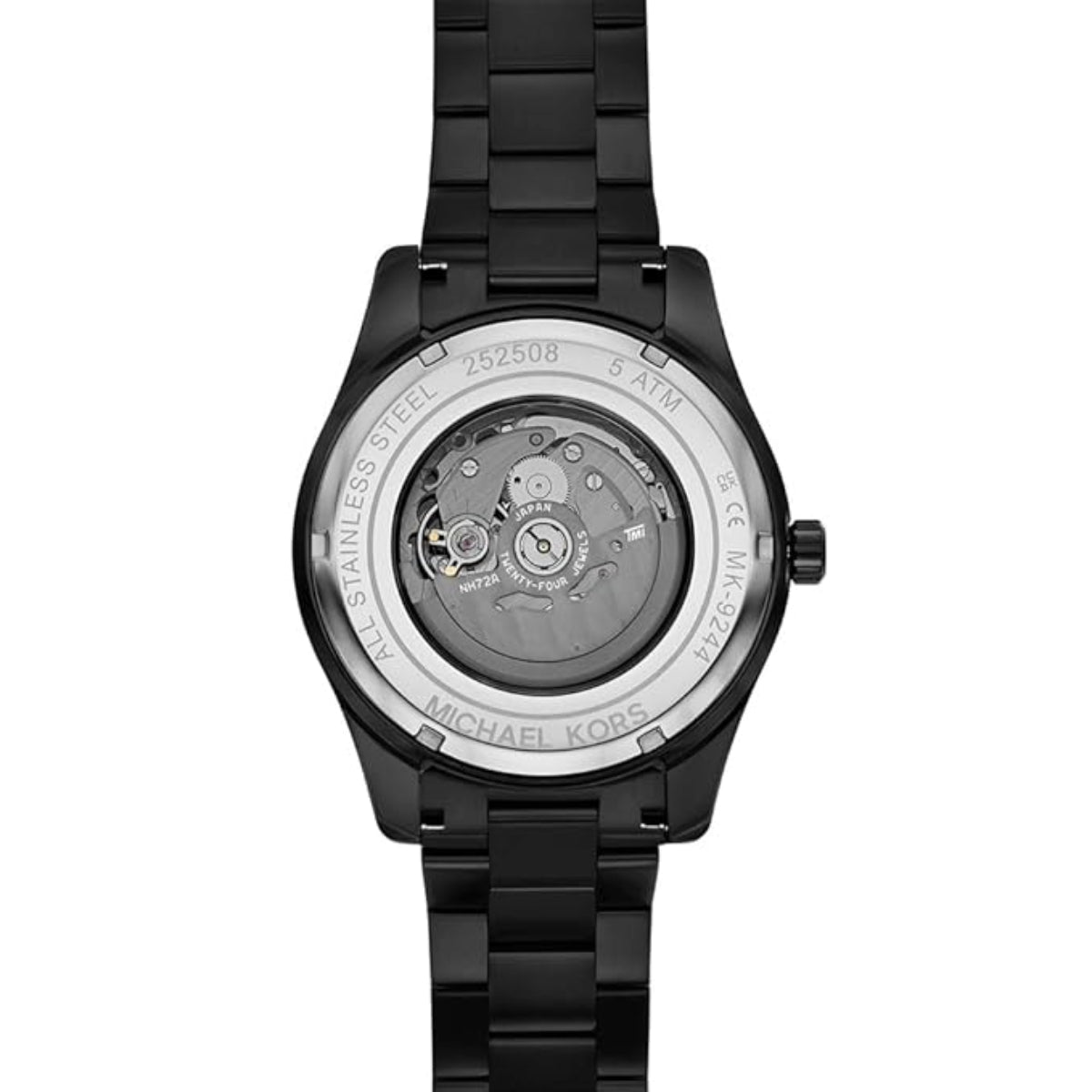 Black Michael Kors watch with transparent back on a white background