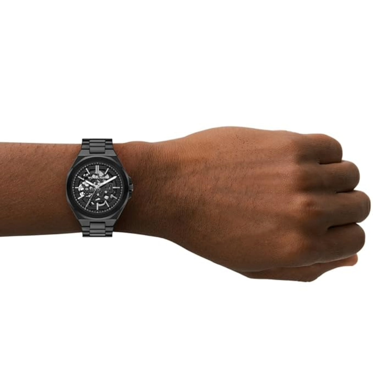 Black watch on a wrist against a white background