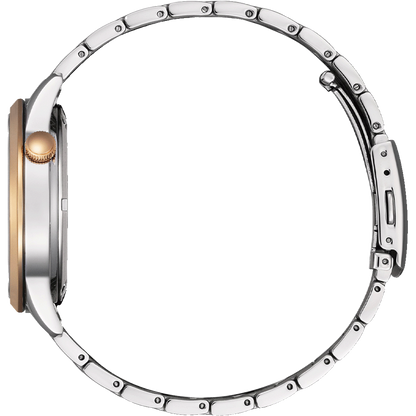 Close-up of a silver watch with a rose gold accent on a white background