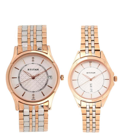 A couple's watch with a silver and rose gold two-tone band and analog display, with the brand name TITAN visible.