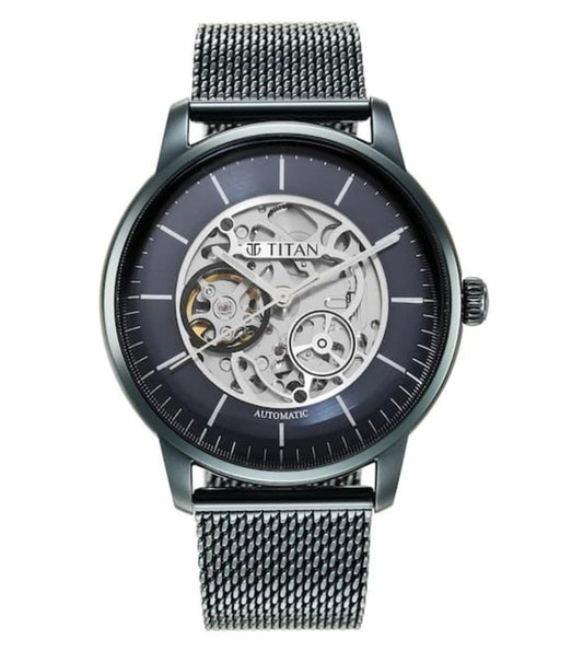 A TITAN mechanical automatic watch for men with a blue round dial and a stainless steel strap.