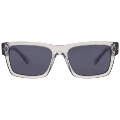 Sunglasses with clear frame and dark lenses on a white background