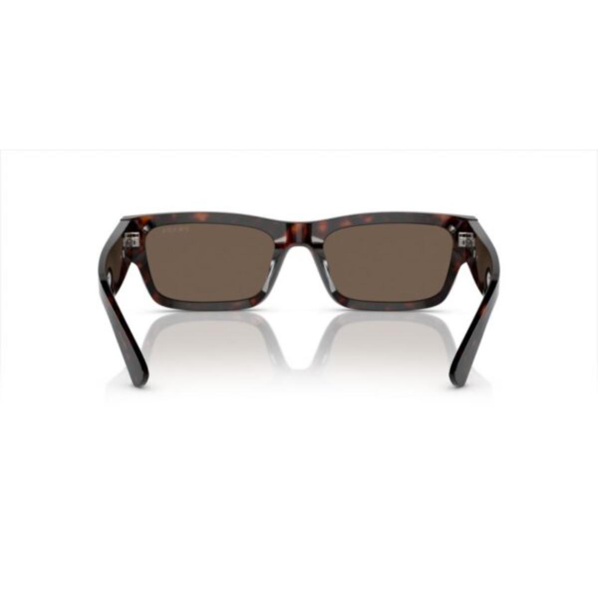 Sunglasses with tortoiseshell frame and dark lenses on a white background