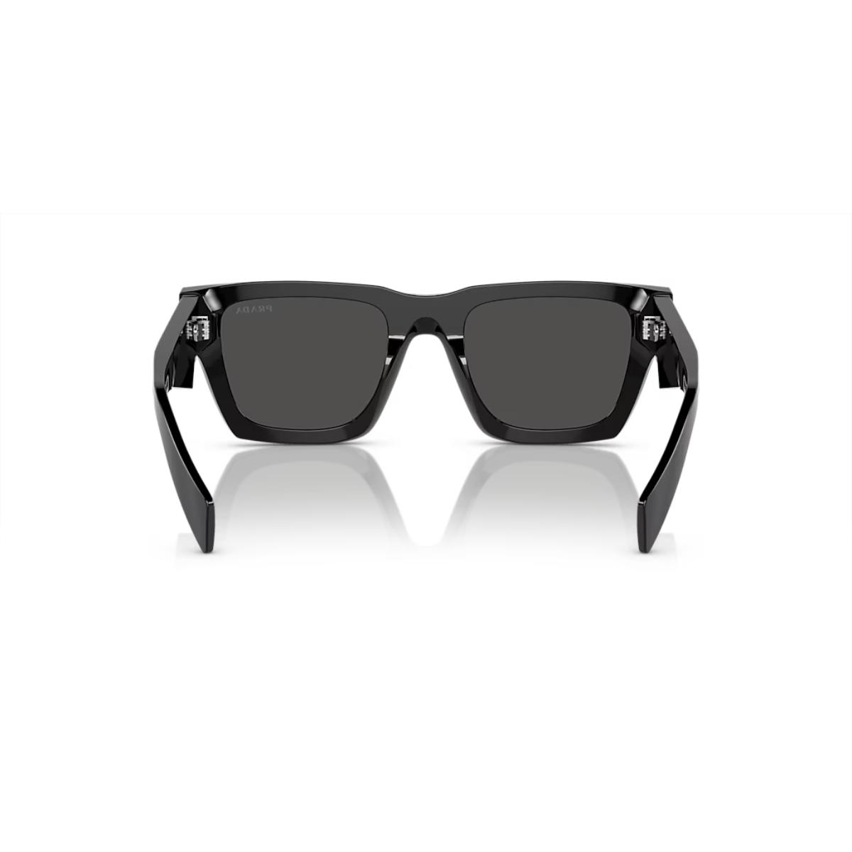 Black sunglasses with a reflective surface on a white background