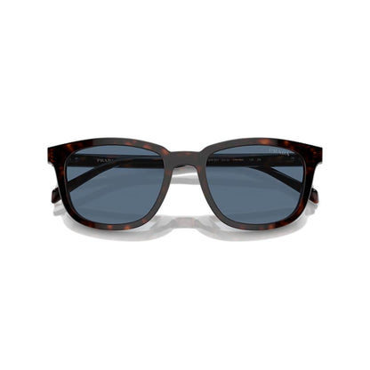 Sunglasses with tortoiseshell frame and dark lenses on a white background