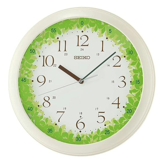 Seiko wall clock with green floral design on a white background