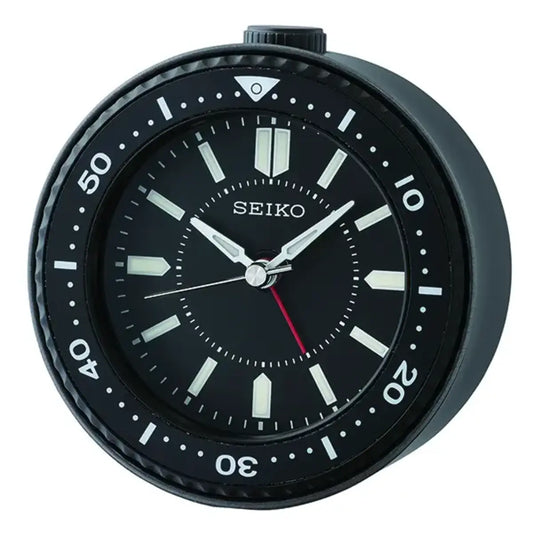 Black Seiko watch with white markings on a white background