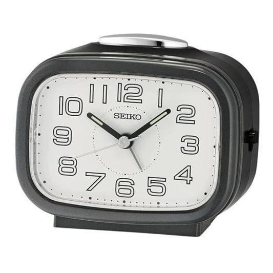 Seiko alarm clock with black casing on a white background