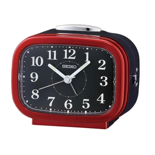 Red and black Seiko alarm clock on a white background