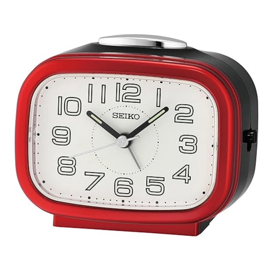 Red Seiko alarm clock on a white background