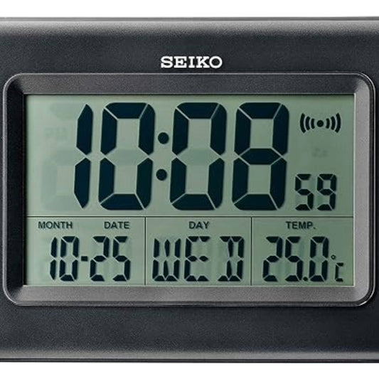 Digital clock with Seiko branding displaying time, date, temperature, and month.