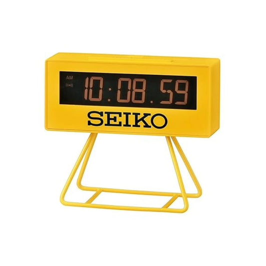 Yellow Seiko digital clock on a white background