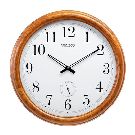 Seiko wall clock with wooden frame on a white background