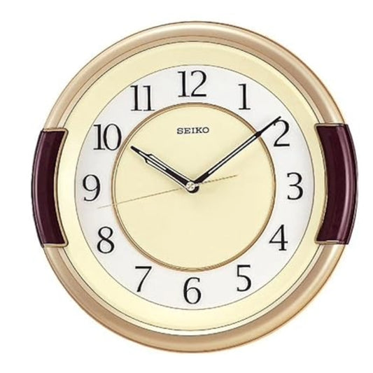 Seiko wall clock with gold frame and burgundy accents on a white background