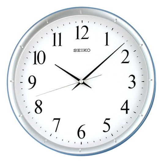 Seiko wall clock with white face and black numbers on a white background