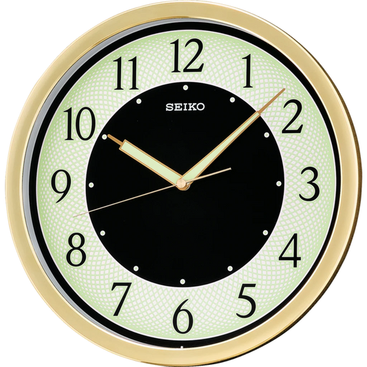 Seiko wall clock with gold frame and black face on a white background