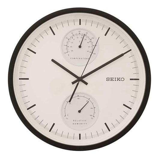 Seiko wall clock with temperature and humidity indicators on a white background