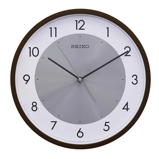 Seiko wall clock with brown frame and white face on a white background