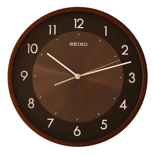 Seiko wall clock with brown face and wooden frame on a white background