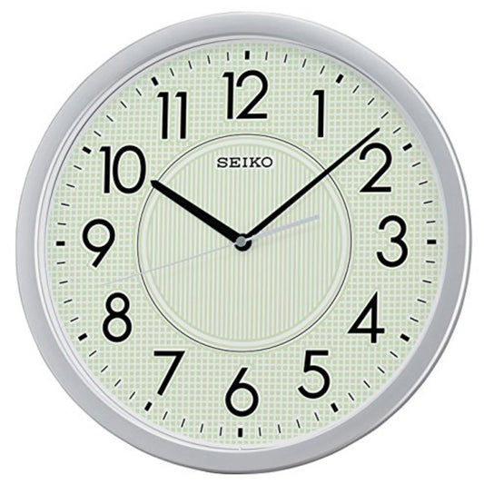 Seiko wall clock with a light green face and silver frame on a white background