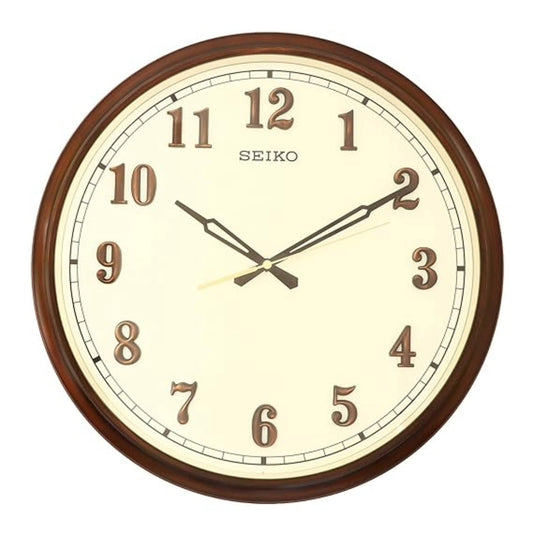 Seiko wall clock with brown frame and beige face on a white background
