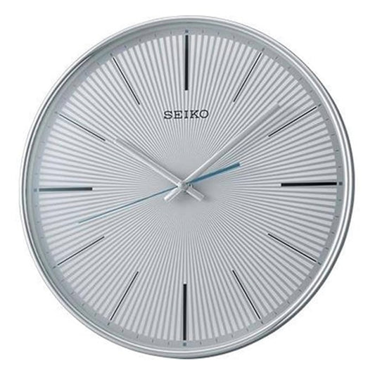 Seiko wall clock with white face and silver rim on a white background