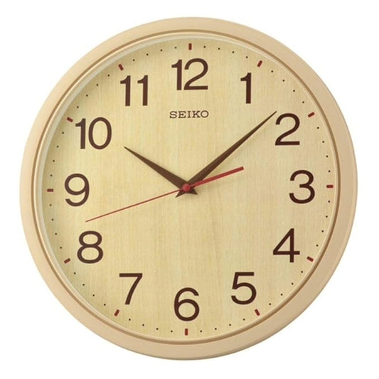 Seiko wall clock with beige face and wooden casing on a white background